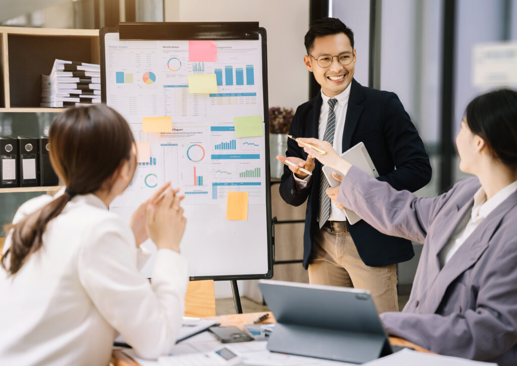A sales team discussing sales strategies together.