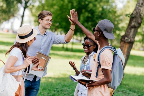 A sales rep using outreach strategies in talking to his customers.